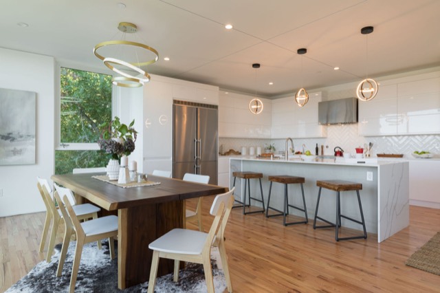Modern kitchen with quartz counters and city views